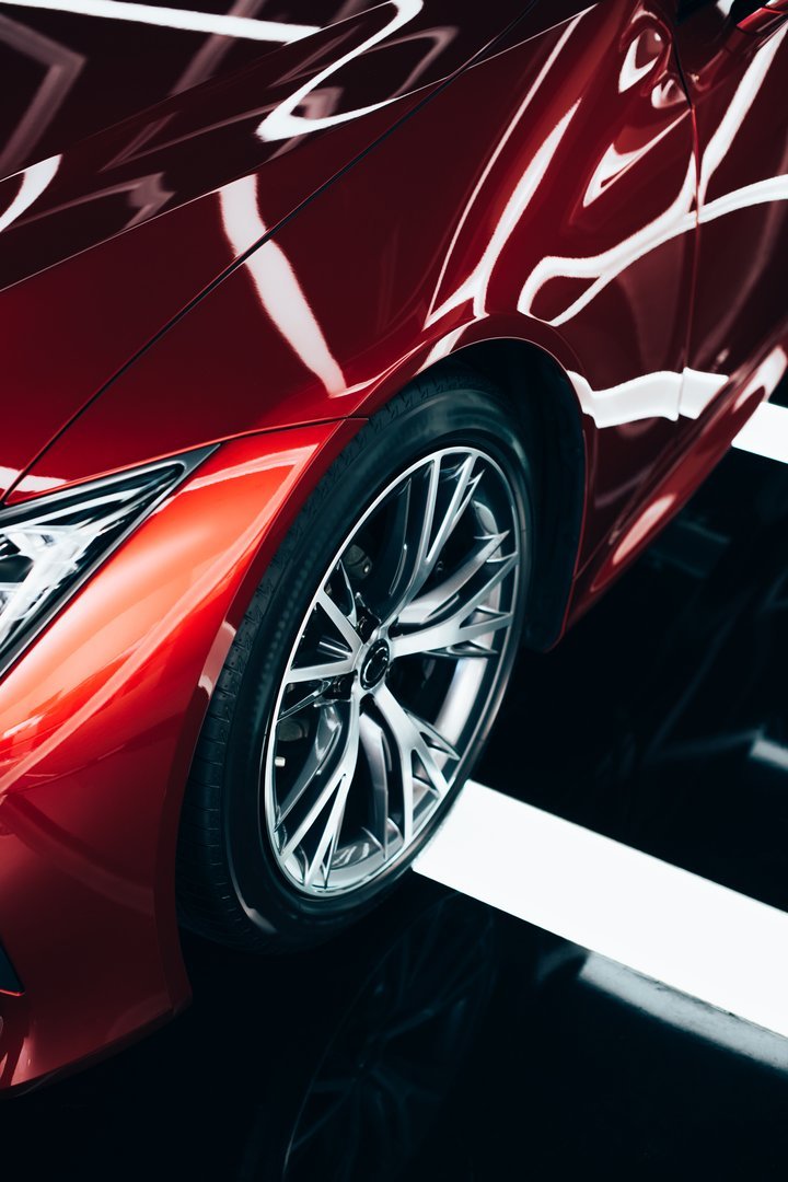 new-shiny-red-automobile-with-metallic-wheel-in-ca-2023-11-27-05-11-20-utc.jpg